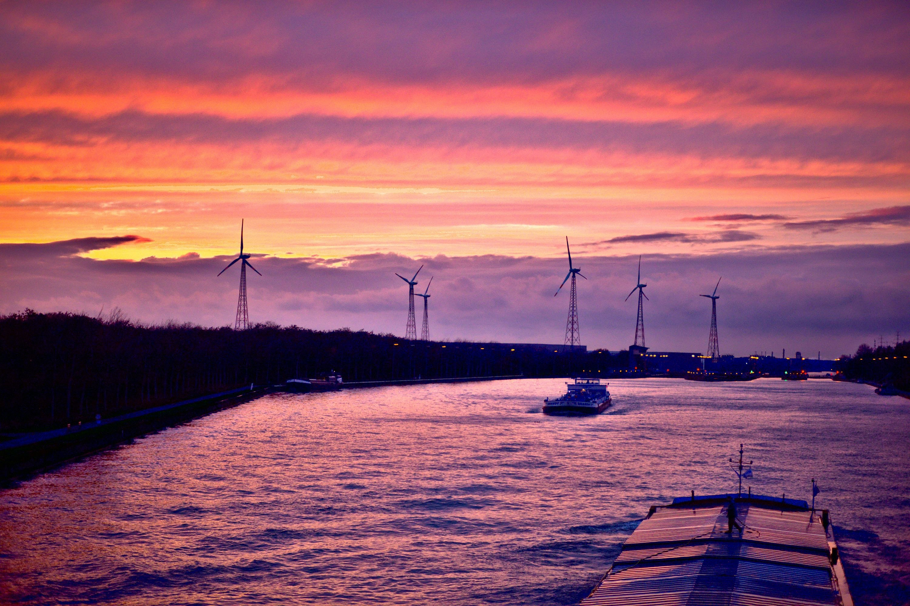 boat on river during sunset